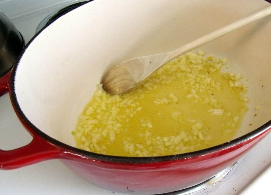Cool onion in olive oil