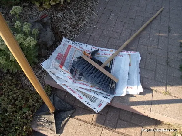 supplies to solve weeds in driveway bricks