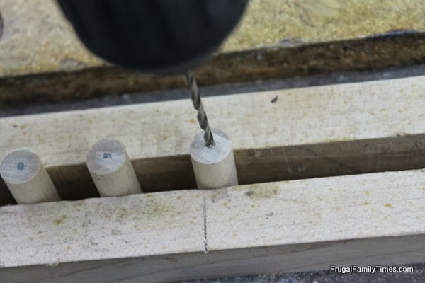 drilling holes for dowels for Lego Cabinet Knobs