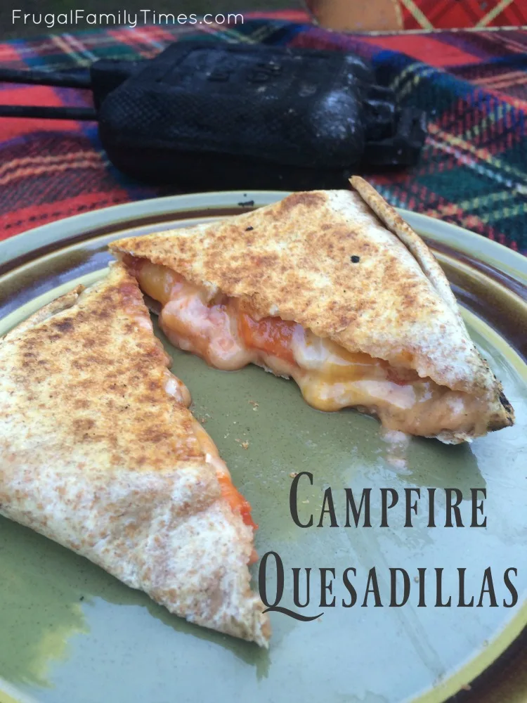 https://www.frugalfamilytimes.com/wp-content/uploads/2016/08/CampfireQuesadillaswithPieIrons.jpg.webp