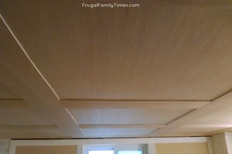 basement wood panel ceiling square strips before finishing