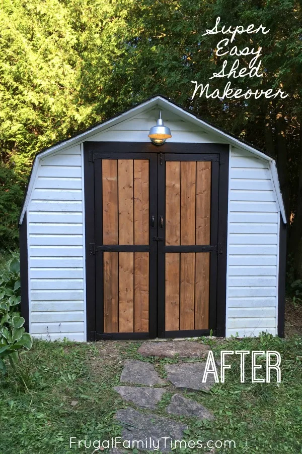 From f'ugly to farmhouse shed makeover on a budget! The projects at our mobile home makeover continue - this time we redo our bizarre shed by giving it new paint and a natural wood look on the doors with an affordable barn style light. A pretty cheap transformation! #howto #diy #shed #outdoorproject #makeover #farmhouse #cottage #cabin #frugalfamilytimes DIY shed makeover