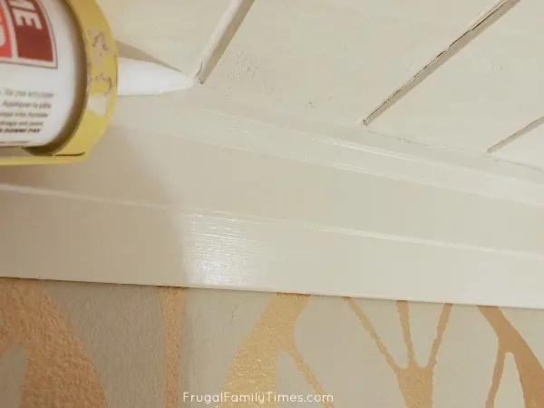 How to Install Tongue and Groove Ceiling Planks - it's so simple and you can do it! 13 filling gaps at crown moulding on tongue and groove ceiling