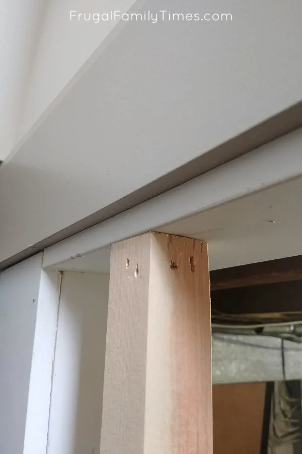 Hidden Storage Under Stairs (with Modern DIY Basement Railing) 11 nail stail railing at top