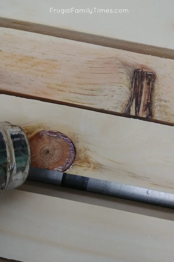 Hidden Storage Under Stairs (with Modern DIY Basement Railing) 9 seal knots on wood before painting