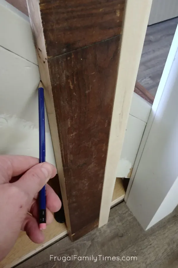 Hidden Storage Under Stairs (with Modern DIY Basement Railing) 10 use jig to place next balluster