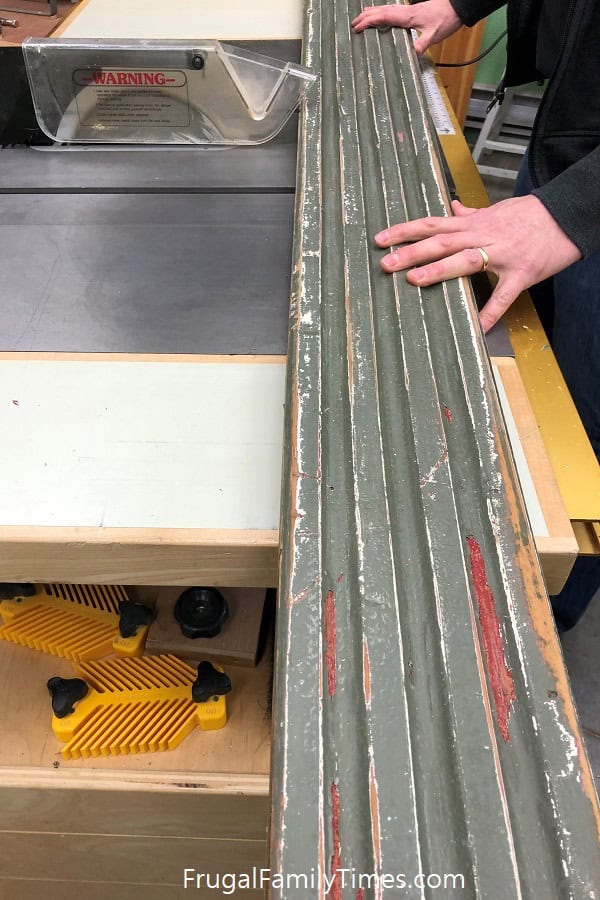 cutting reclaimed wood coat rack from antique box molding