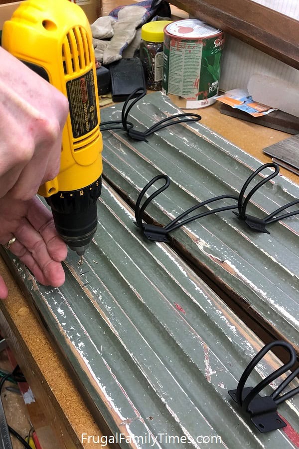 attaching hooks to reclaimed wood coat rack