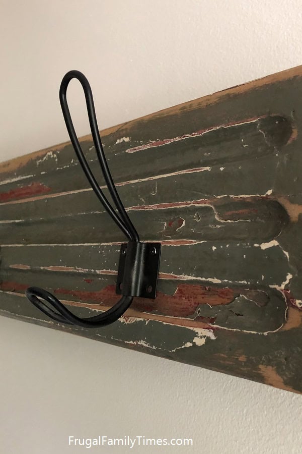 rustic hooks on reclaimed wood