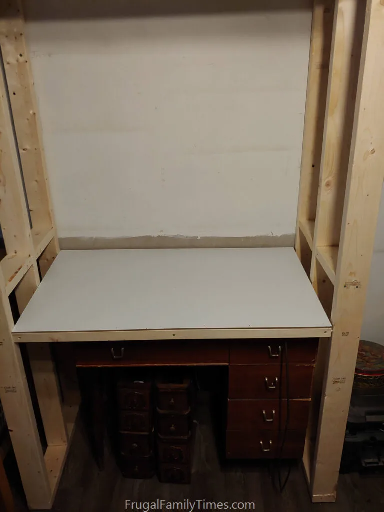 custom shelf height in crafts cupboard