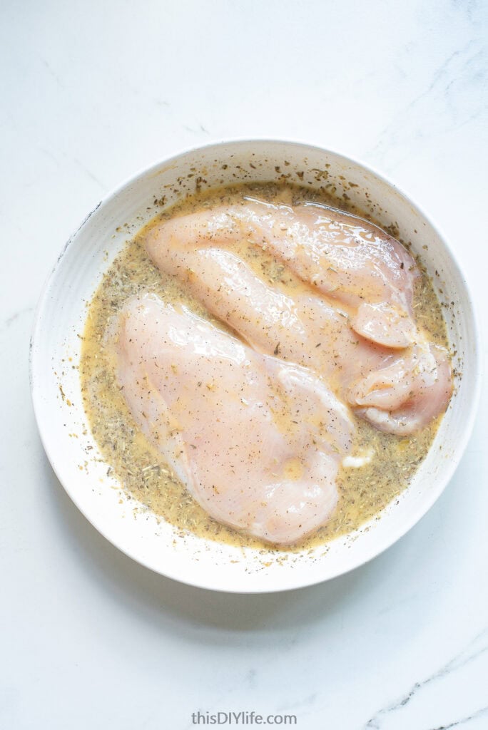 chicken in garlic parmesan cheese egg mixture