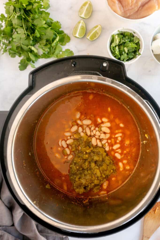 beans and spices for cream cheese chicken chili instant pot