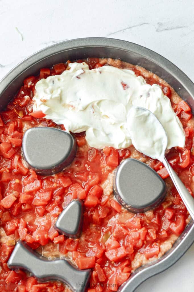 tomatoes and sour cream layers for halloween seven layer dip