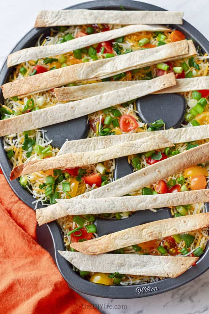 halloween seven layer dip as a mummy